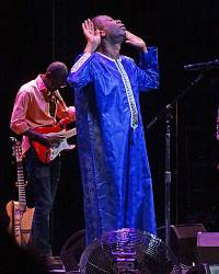 Youssou asks us to sing along